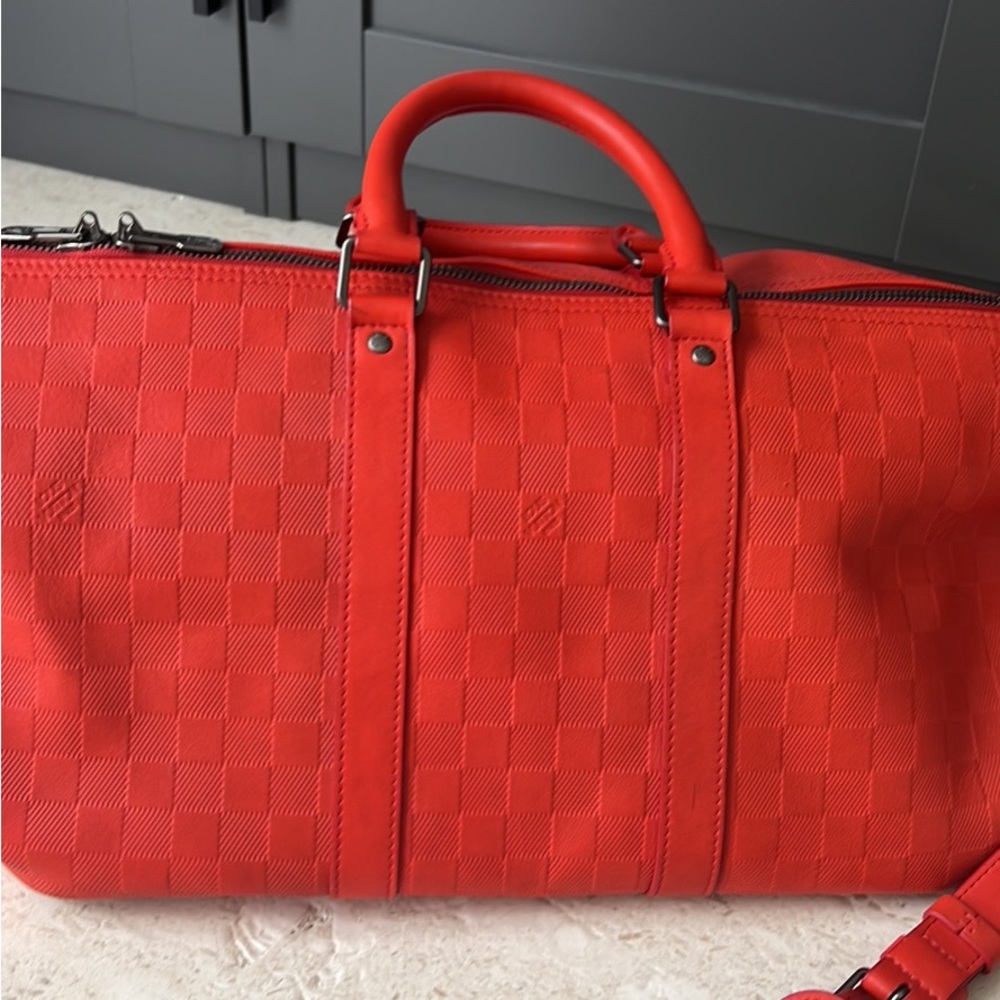 Authentic Louis Vuitton Duffle red/orange duffle - Picture 2 of 8